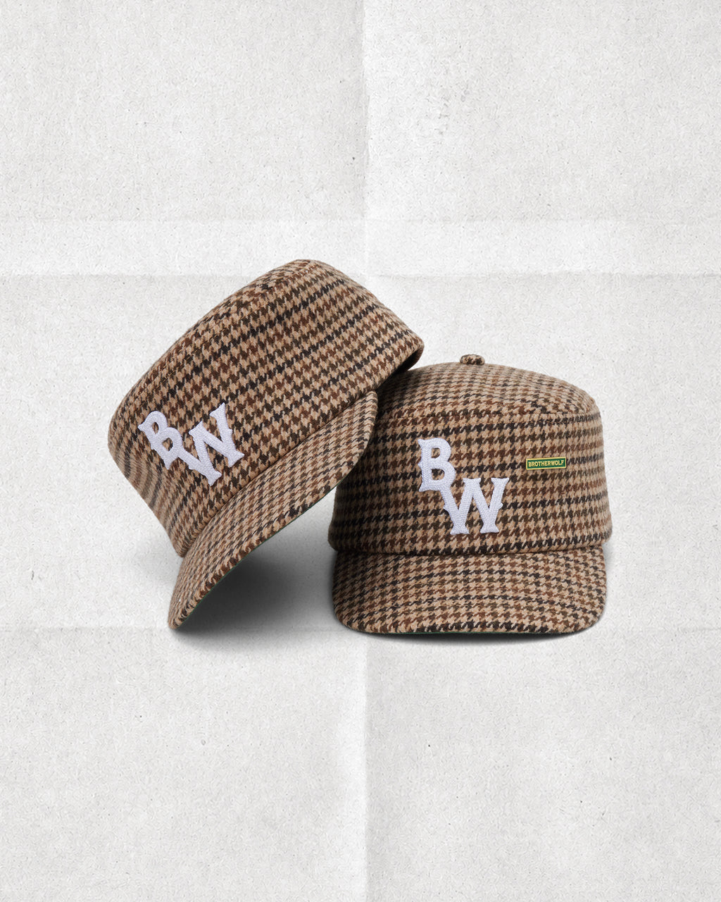 Two Brotherwolf Pillbox Caps in brown and tan houndstooth