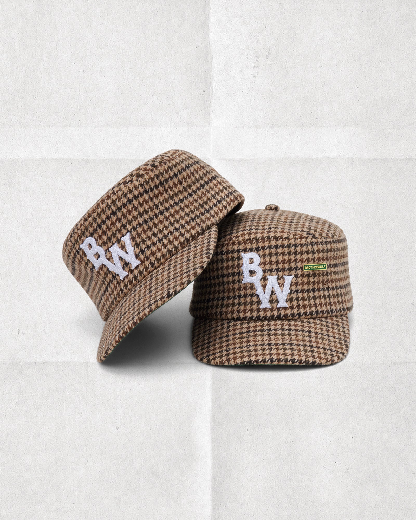 Two Brotherwolf Pillbox Caps in brown and tan houndstooth