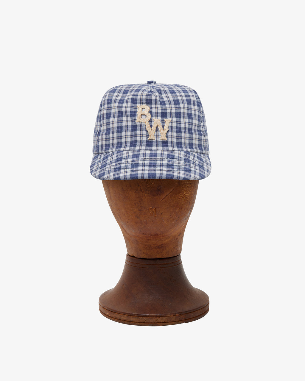 Brotherwolf Caddy Cap shown on a hat block