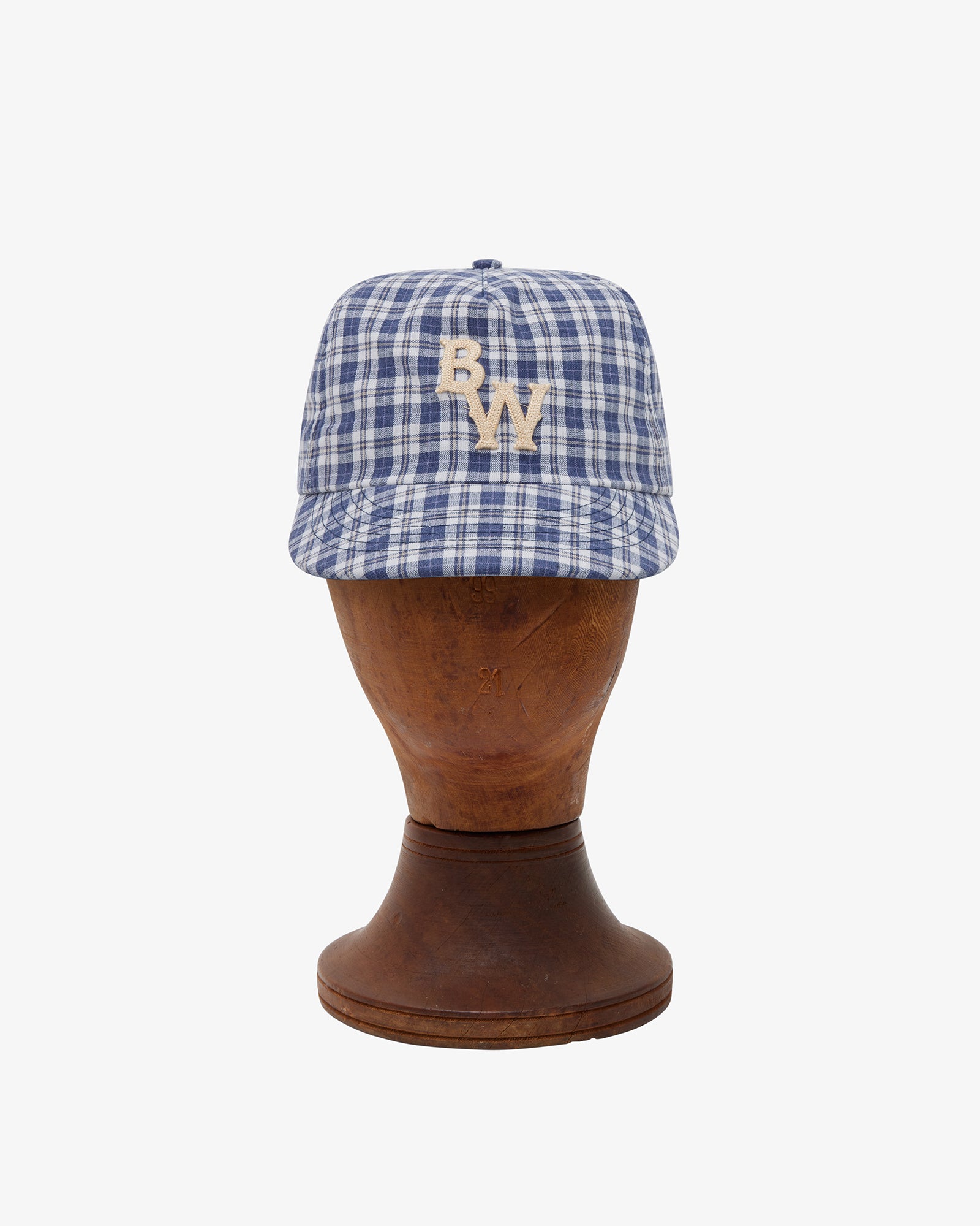 Brotherwolf Caddy Cap shown on a hat block