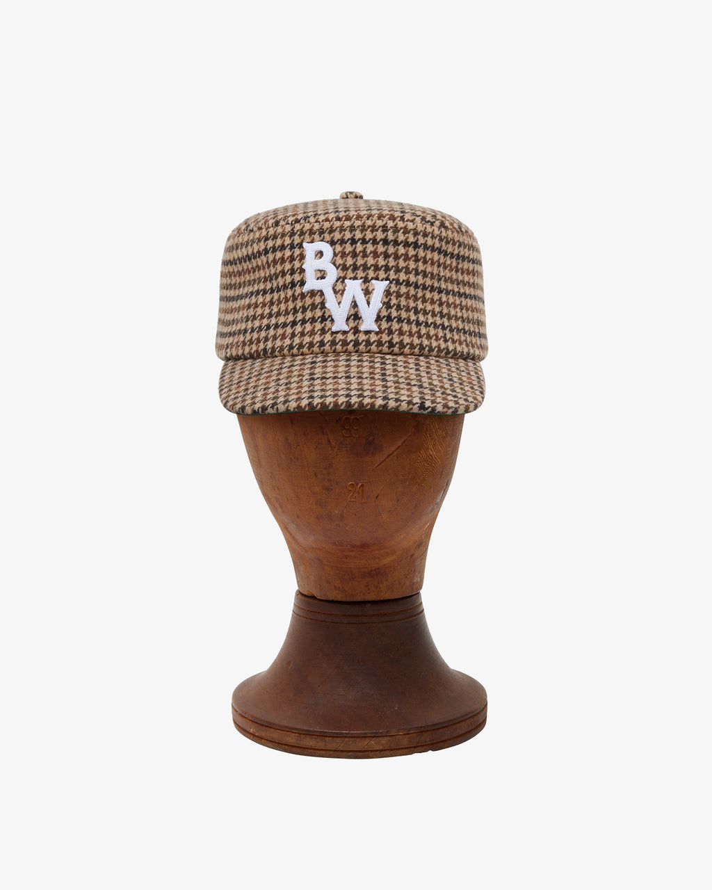 Brotherwolf Pillbox Cap shown on a hat block